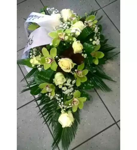 Funeral arrangement: white roses and orchids