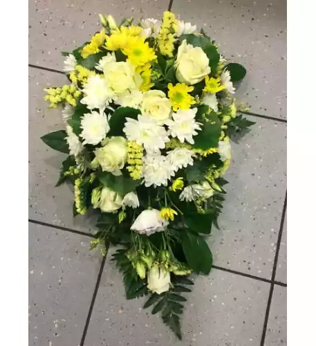 Funeral arangement: white roses, white and yellow chrysantemums