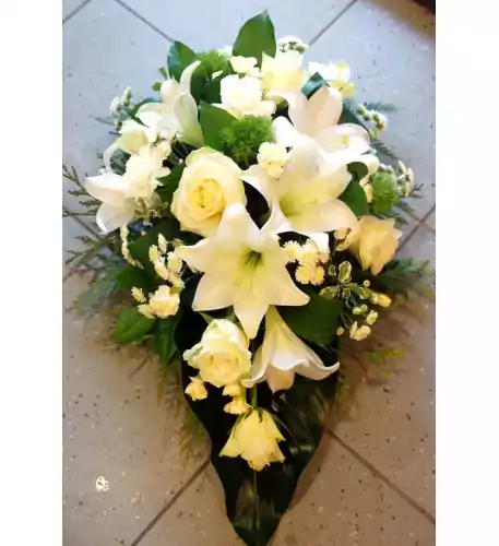 Funeral arrangement- white lilys and roses