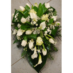 Funeral arrangement of white callas and tulle