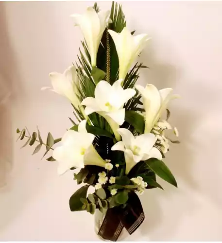 Handtied bouquet of white lilies