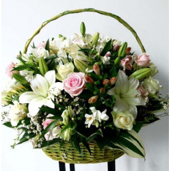 Big basket of white and pink flowers; Lilys, Roses, Fresias etc