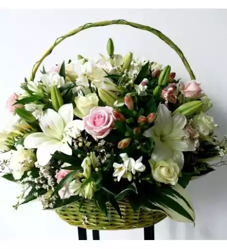 Big basket of white and pink flowers; Lilys, Roses, Fresias etc