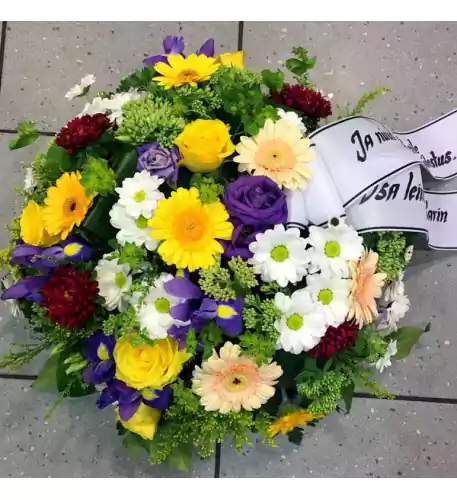 Round-shaped bouquet in yellow, red and blue shades