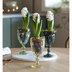 3 pieces of swivels in a glass pot on a stand