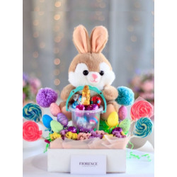 Cute Easter Bunny with chocolates