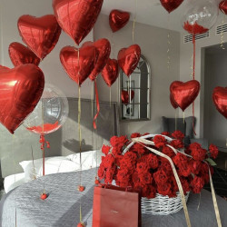 25 Red Roses Basket with 25 Heart Foil Balloons Arrangement