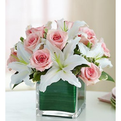 Low Arrangement Of Pink Roses And White Lilium