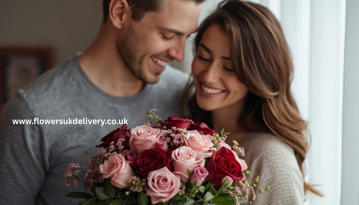 Happy couple with Valentine's Day flowers romantic gifts UK delivery